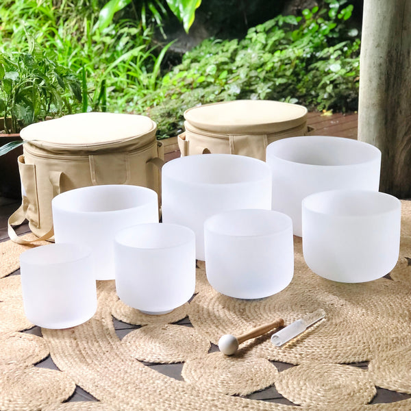 SET OF 7 WHITE CRYSTAL SINGING BOWLS IN BEIGE BAGS