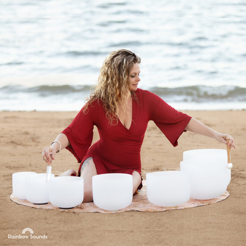 SET OF 7 WHITE CRYSTAL SINGING BOWLS IN BEIGE BAGS